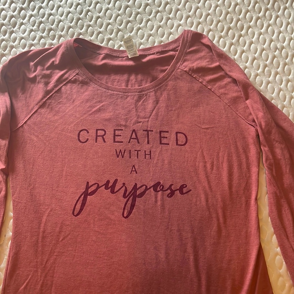 Long-sleeved rose colored T-shirt